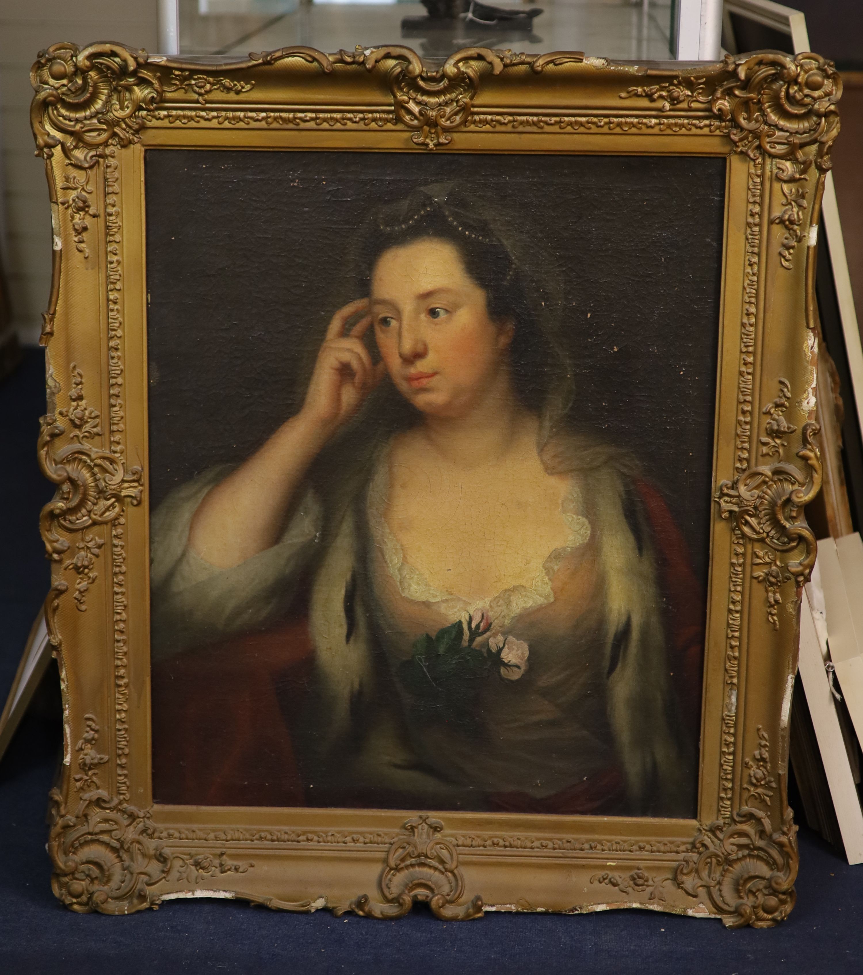 Mid 18th century English School, Portrait of a lady with pearls in her hair, Oil on canvas, 75 x 62cm.